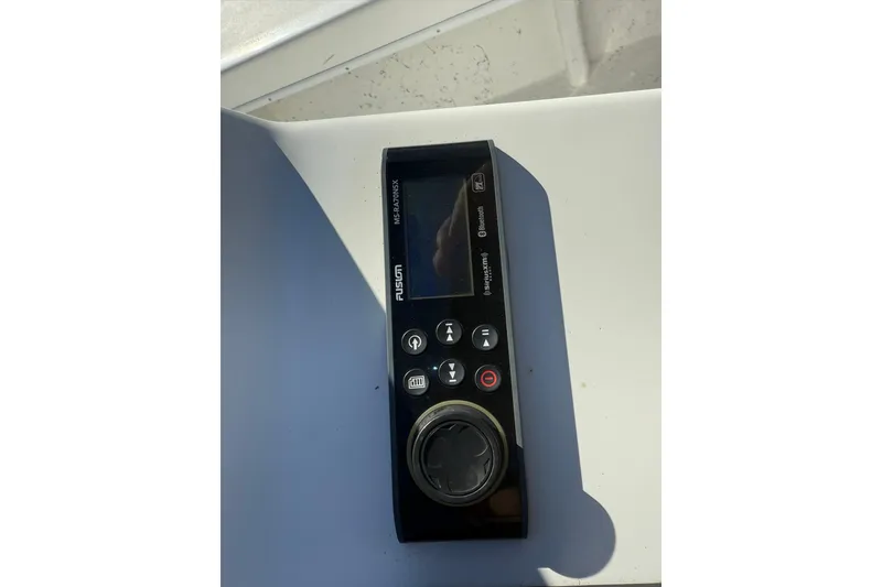 Slide: The Image of 2023 C-Hawk 23 Center Console boat stereo system with Bluetooth connectivity. - 13