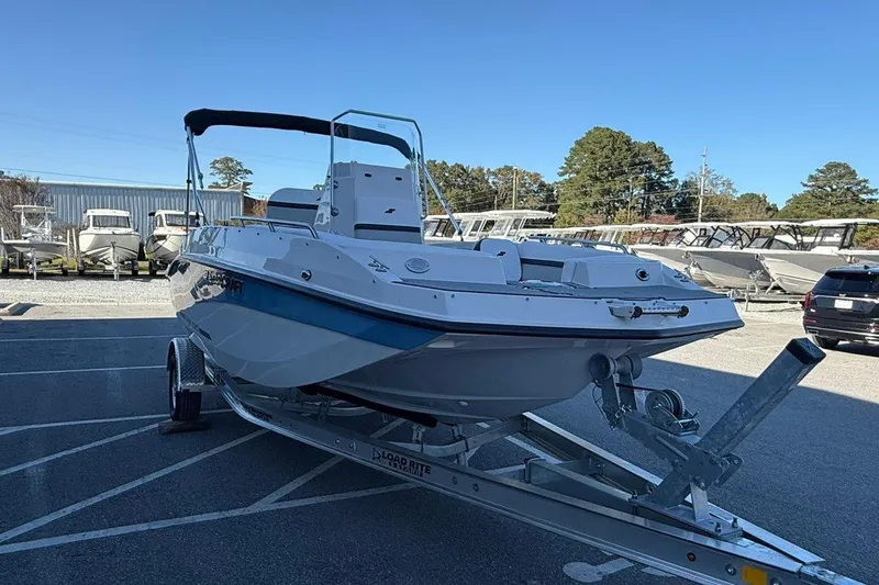 Slide: The Image of 2026 Starcraft SVX 191 OB boat on trailer in outdoor showroom. - 5