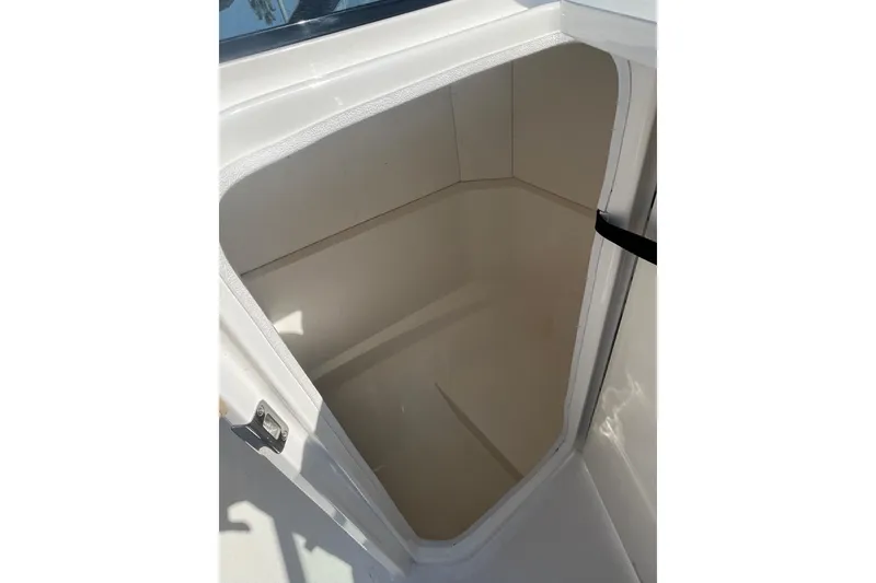 Slide: The Image of Storage compartment in 2023 Sea Ray SPX 230 Outboard boat, open and empty. - 5