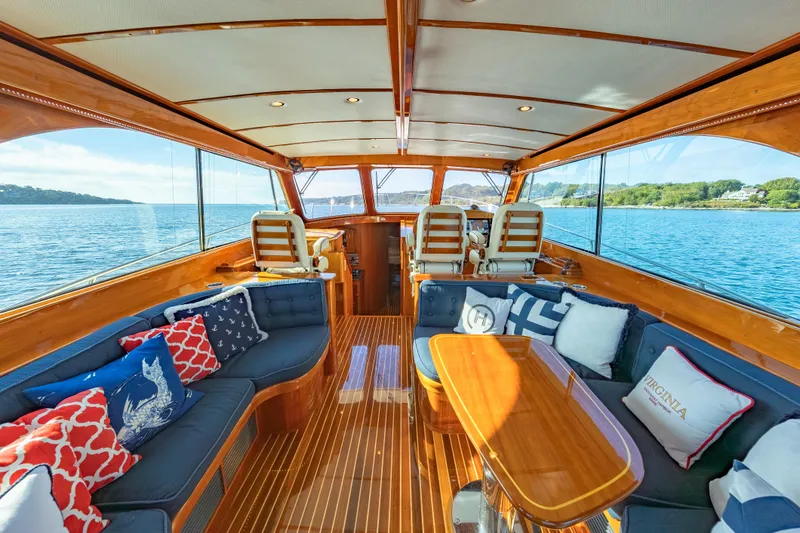 Slide: The Image of Luxurious interior of 2013 Hinckley Talaria 48 Flybridge yacht with elegant seating and scenic ocean view. - 20