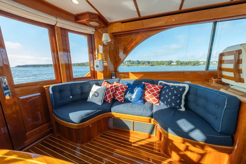 Slide: The Image of Luxurious interior of 2013 Hinckley Talaria 48 Flybridge with plush seating and nautical decor. - 21