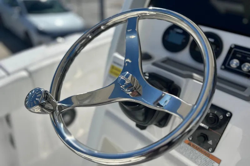 Slide: The Image of Steering wheel of 2026 Sea Fox 228 Commander boat, showcasing sleek design and controls. - 20