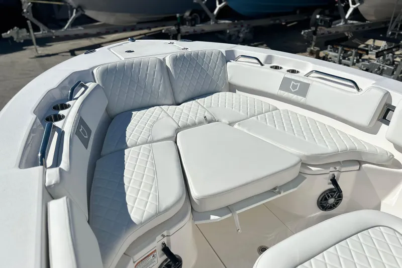 Slide: The Image of 2026 Sea Fox 228 Commander boat with luxurious white seating and cup holders. - 6