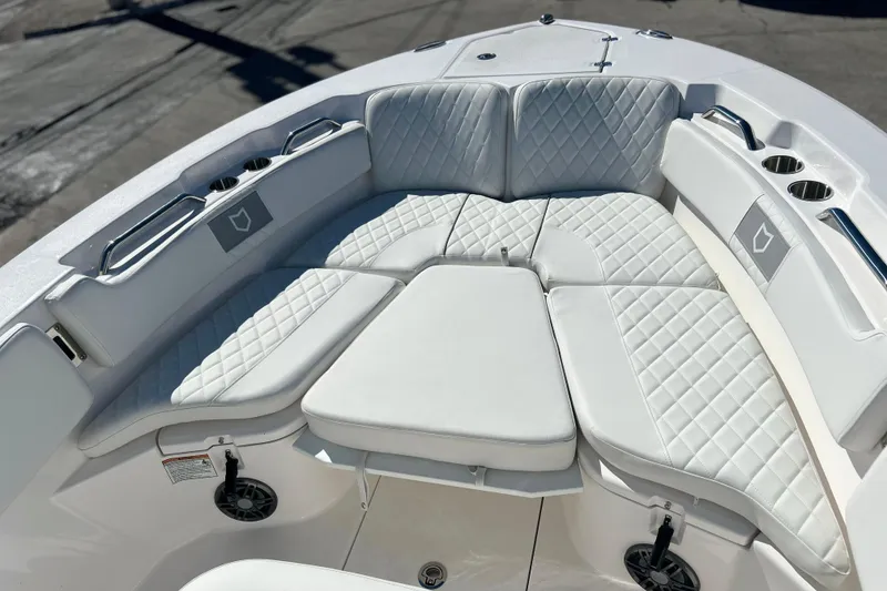 Slide: The Image of Luxurious seating on 2026 Sea Fox 228 Commander boat with quilted white upholstery. - 8