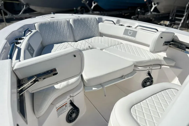 Slide: The Image of Luxurious seating on 2026 Sea Fox 228 Commander boat with quilted white upholstery. - 9
