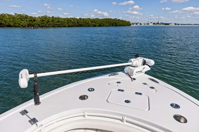 Slide: The Image of 2021 Barker Boatworks 26 Open on water, featuring Minn Kota trolling motor. - 14