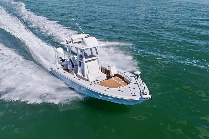 Slide: The Image of 2021 Barker Boatworks 26 Open cruising on open water, showcasing sleek design and performance. - 43
