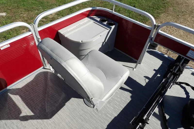 Slide: The Image of 2022 Bennington 20 SVF boat interior with red paneling and gray seating. - 16