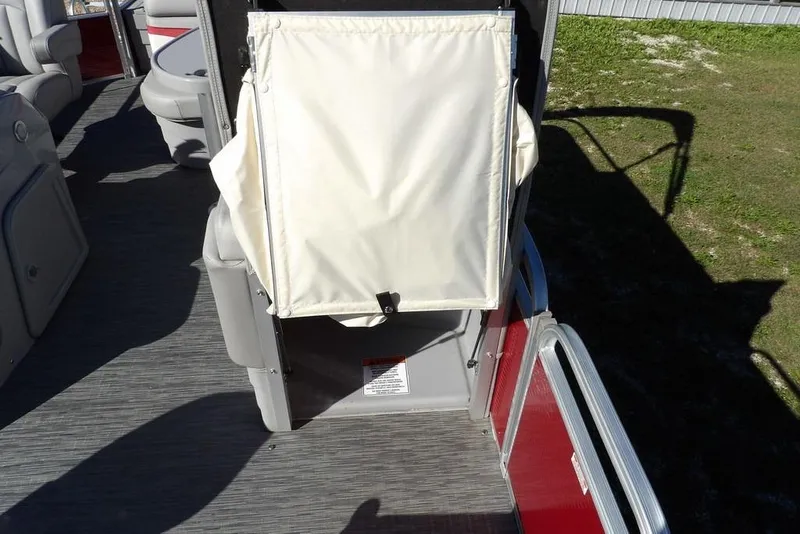Slide: The Image of 2022 Bennington 20 SVF pontoon boat interior with seating and storage area. - 23