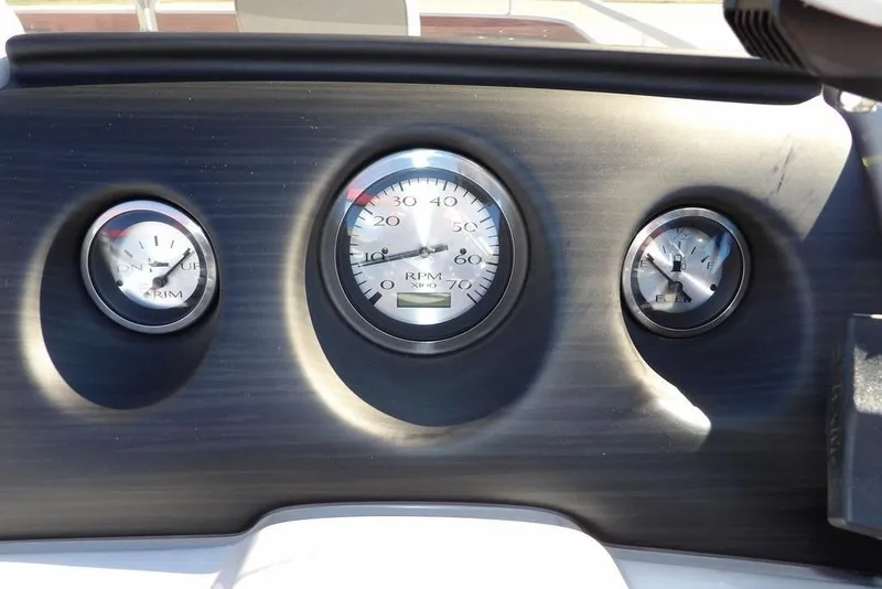 Slide: The Image of Dashboard of 2022 Bennington 20 SVF boat with RPM and fuel gauges. - 32