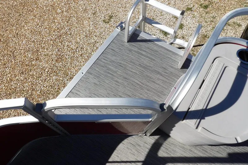 Slide: The Image of 2022 Bennington 20 SVF boat deck with ladder and textured flooring. - 38