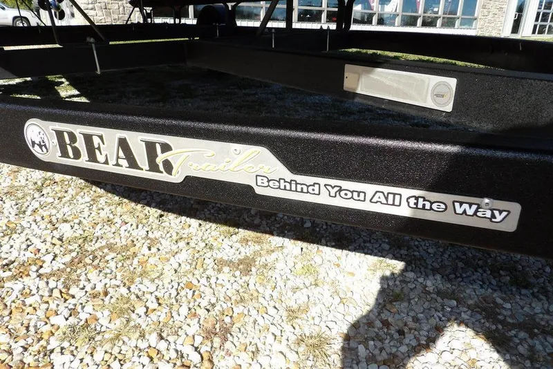 Slide: The Image of Bear trailer with "Behind You All the Way" slogan, gravel ground, Bennington 20 SVF 2022. - 39