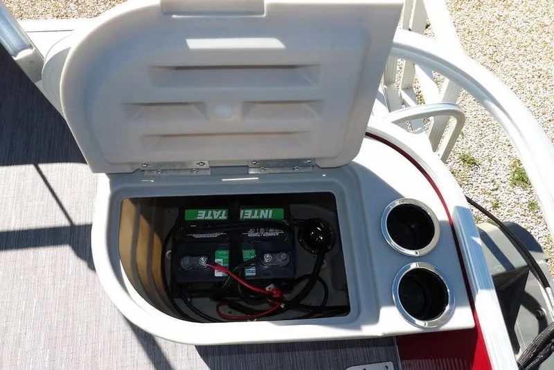 Slide: The Image of Battery compartment of 2022 Bennington 20 SVF boat with cup holders. - 42