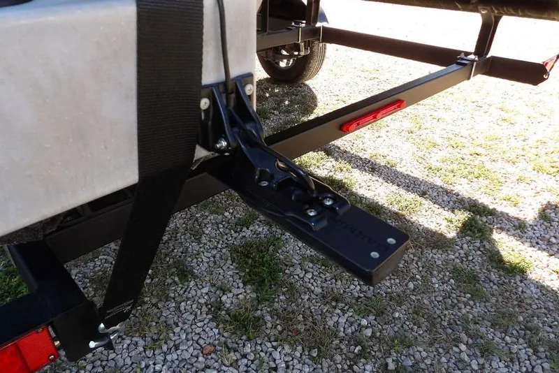 Slide: The Image of Trailer hitch detail of 2022 Bennington 20 SVF on gravel surface. - 54