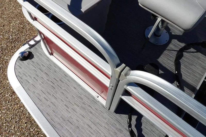 Slide: The Image of 2022 Bennington 20 SVF pontoon boat deck with seating and railing details. - 8