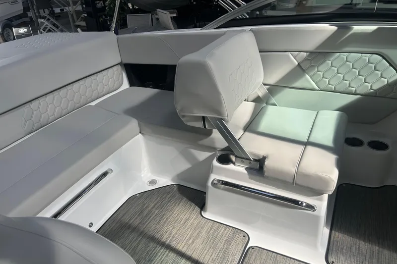 Slide: The Image of 2026 Four Winns H1 Freedom boat interior with sleek, modern seating and stylish design. - 20