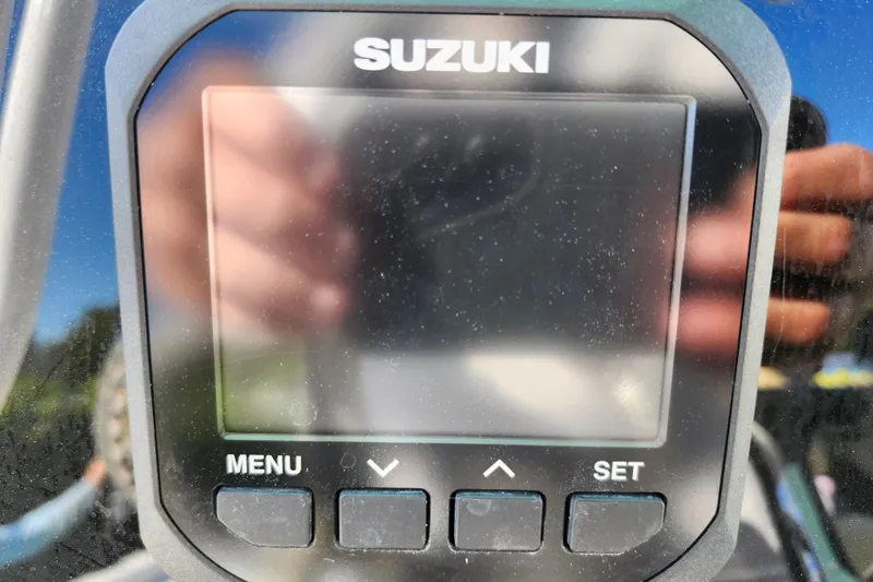 Slide: The Image of Close-up of Suzuki display screen on 2026 Savannah 220 IS boat. - 24