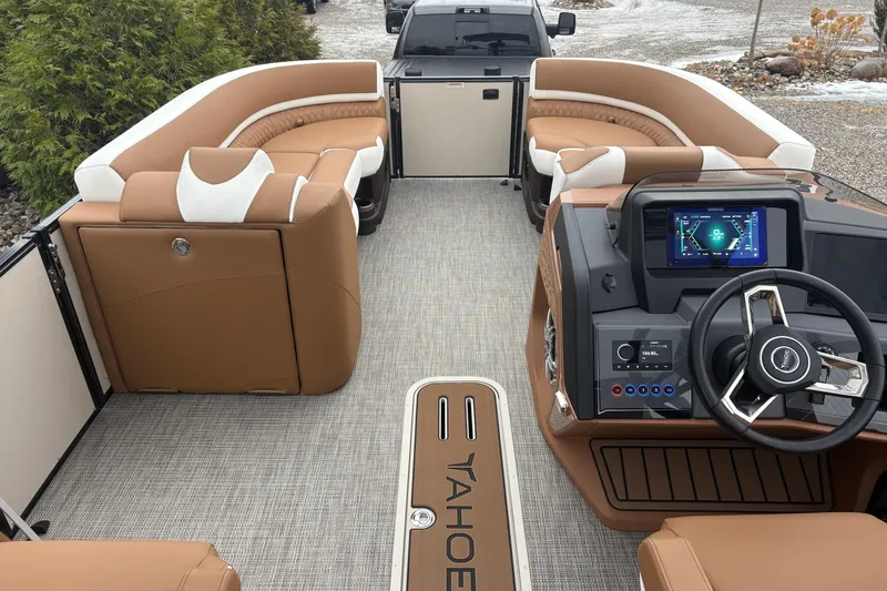 Slide: The Image of 2026 Tahoe Pontoon Cascade Quad Lounger Shift with luxurious seating and modern dashboard. - 16