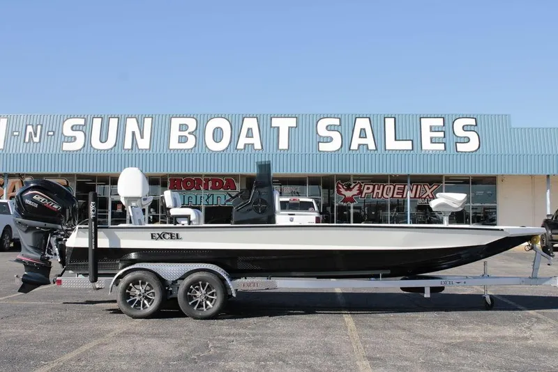 The Image of 2025 Excel Bay Pro Elite 230 boat on trailer at dealership. - 1