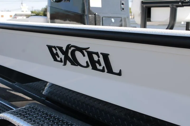 Slide: The Image of 2025 Excel Bay Pro Elite 230 boat with logo on side panel. - 24