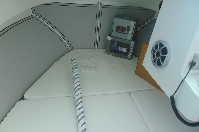 Slide: The Image of Interior of 2026 Parker 247 Explorer boat with Garmin equipment and speaker. - 21