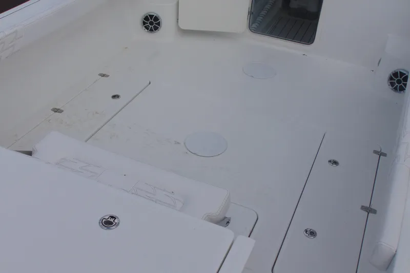 Slide: The Image of 2026 Parker 247 Explorer boat interior with spacious deck and storage compartments. - 6