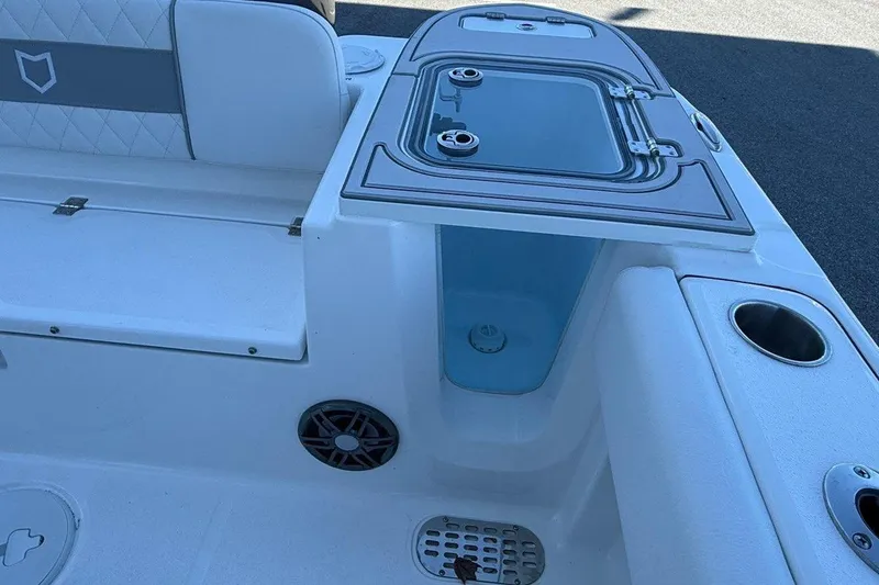 Slide: The Image of 2026 Sea Fox 228 Commander boat interior with seating and storage compartments. - 12