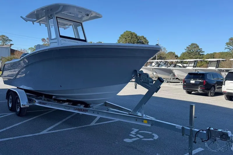 Slide: The Image of 2026 Sea Fox 228 Commander boat on trailer in parking lot. - 6