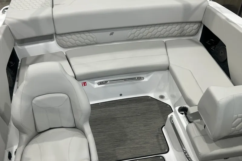 Slide: The Image of Interior of 2026 Four Winns H1 Freedom boat with luxurious seating and modern design. - 22