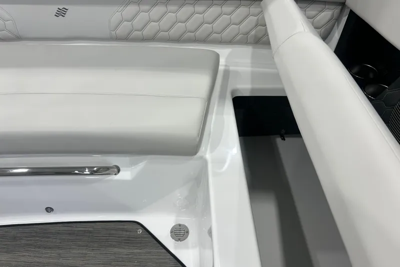 Slide: The Image of Interior seating of 2026 Four Winns H1 Freedom boat with sleek white upholstery. - 24