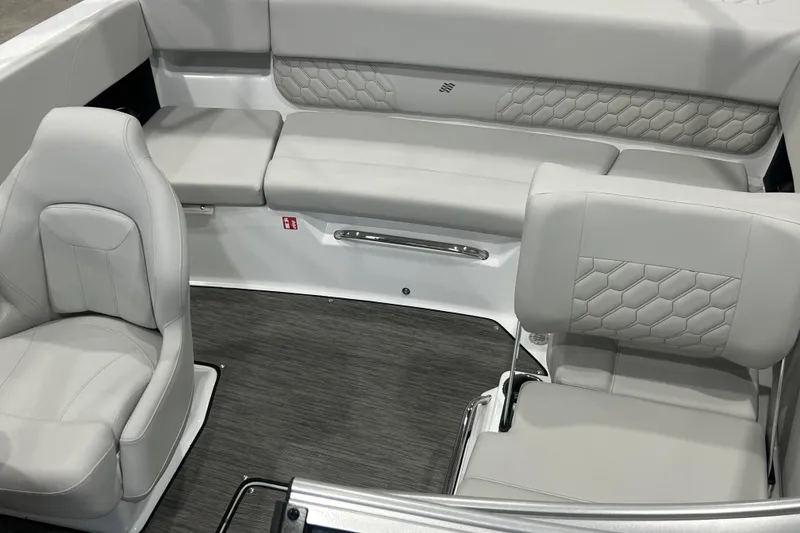 Slide: The Image of 2026 Four Winns H1 Freedom boat interior with luxurious gray seating and modern design. - 26