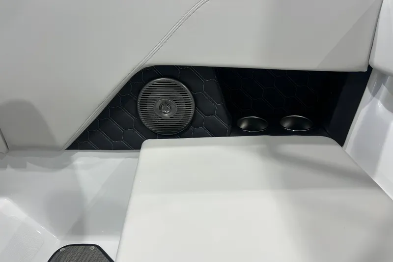 Slide: The Image of 2026 Four Winns H1 Freedom boat interior with speaker and cup holders. - 27