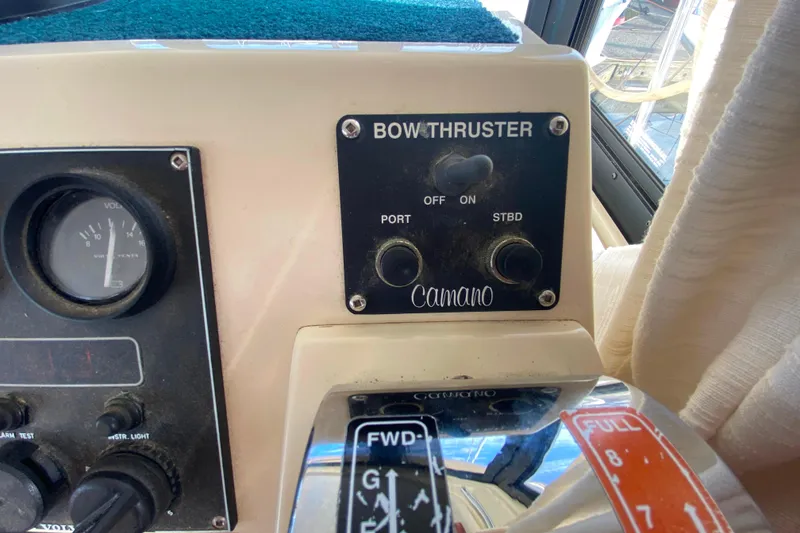 Slide: The Image of Control panel of a Camano 30 boat featuring bow thruster and voltage gauge. - 11