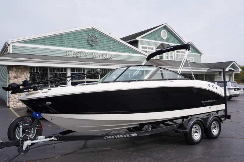 Slide: The Image of 2026 Chaparral 21 SSi Ski & Fish boat on trailer at Reed's Marine. - 0