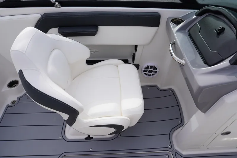Slide: The Image of 2026 Chaparral 21 SSi Ski & Fish boat interior with white seating and modern dashboard. - 42