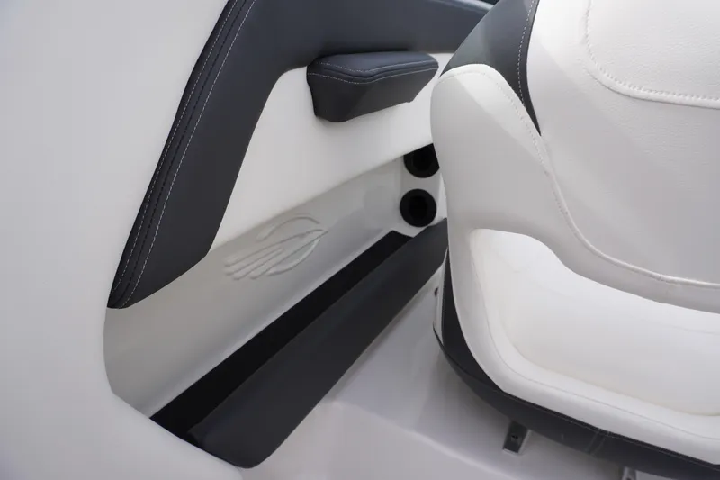 Slide: The Image of Interior of 2026 Chaparral 21 SSi Ski & Fish boat, featuring sleek seating design. - 46