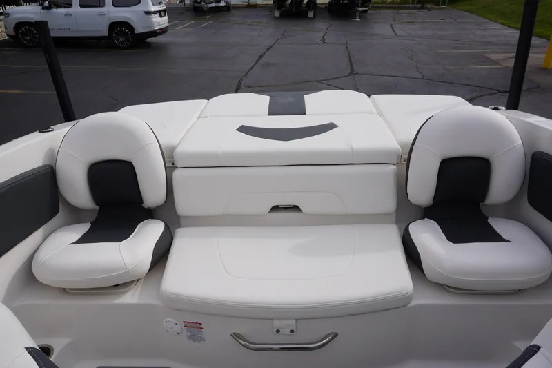 Slide: The Image of 2026 Chaparral 21 SSi Ski & Fish boat interior with white and black seating. - 48