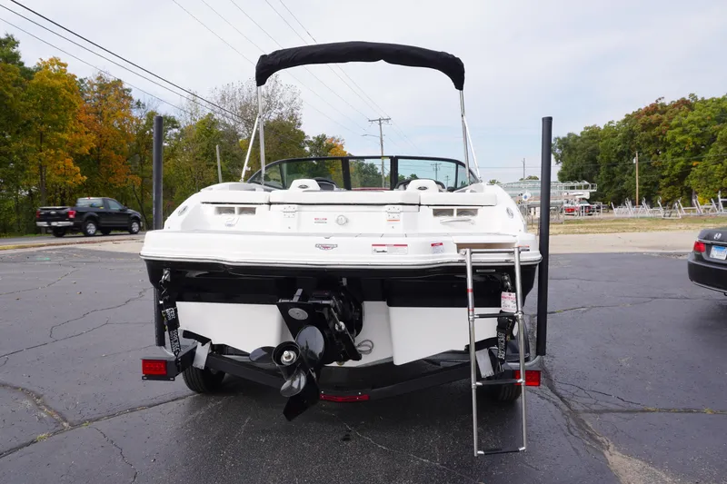 Slide: The Image of 2026 Chaparral 21 SSi Ski & Fish boat, rear view with ladder and propeller. - 7