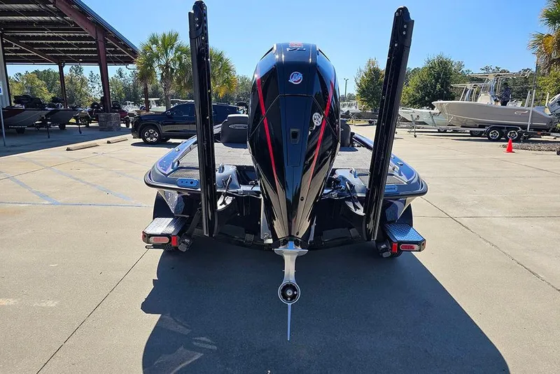 Slide: The Image of 2026 Phoenix 721 ZXL boat rear view in a sunny outdoor setting. - 16