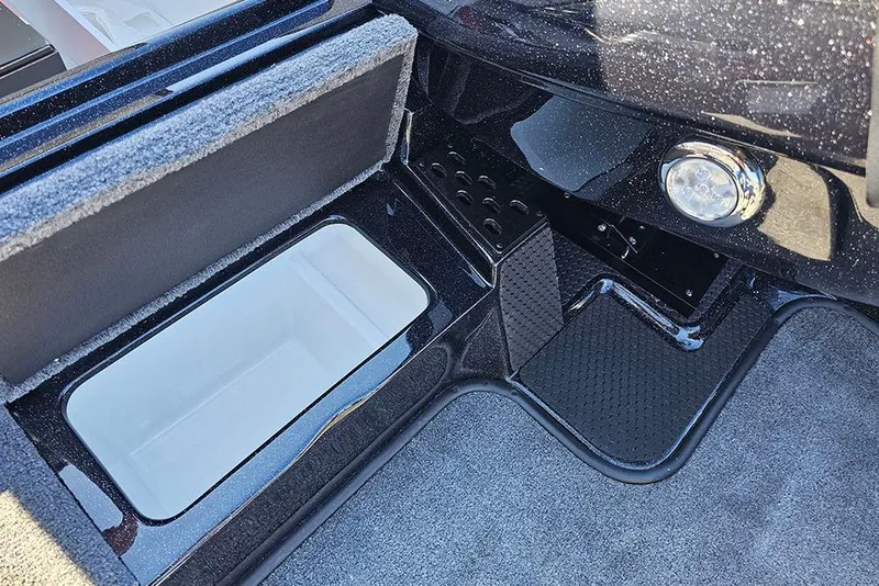 Slide: The Image of 2026 Phoenix 721 ZXL boat interior with storage compartment and LED light. - 29