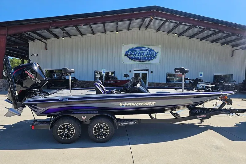 Slide: The Image of 2026 Phoenix 721 ZXL boat parked outside Berkeley Outdoors dealership. - 9