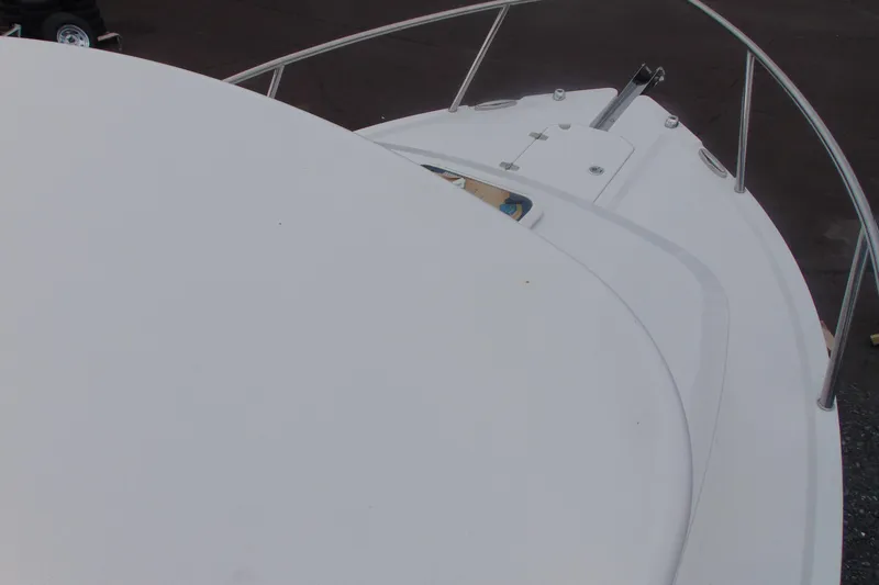 Slide: The Image of Bow view of 2026 Parker 227 Explorer boat with stainless steel railings. - 19