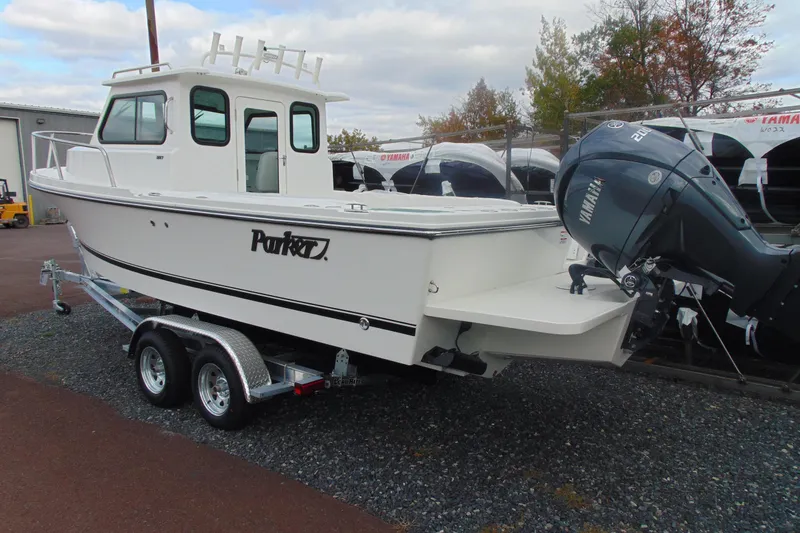 Slide: The Image of 2026 Parker 227 Explorer boat on trailer with Yamaha outboard motor. - 2