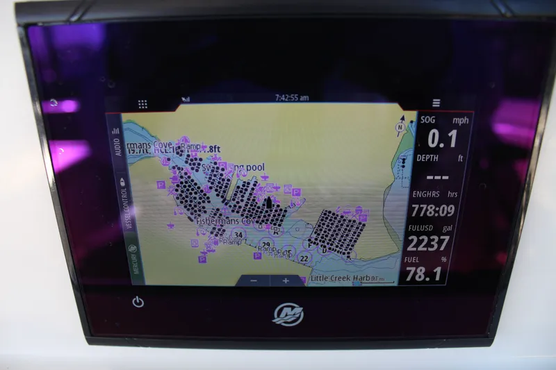 Slide: The Image of Boat navigation display on Sailfish 226DC, 2024 model, showing map and fuel data. - 19