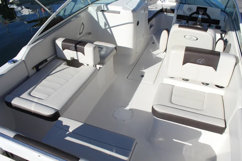 Slide: The Image of 2024 Sailfish 226DC boat interior with white and black seating, modern design. - 23