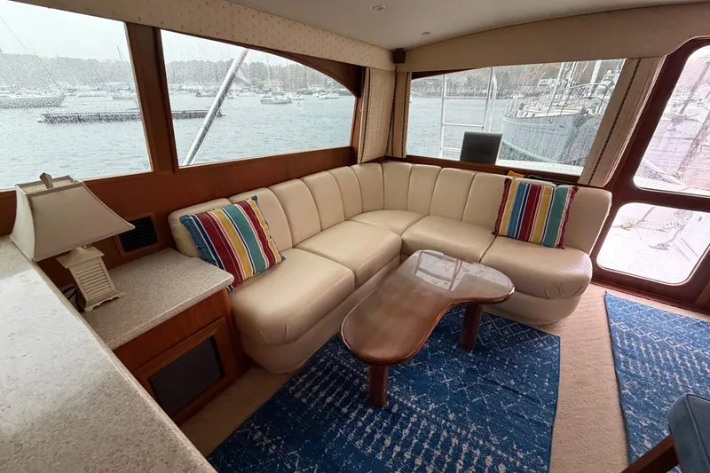 Slide: The Image of Luxurious interior of 2001 Egg Harbor 42 SportYacht with leather seating and nautical decor. - 16