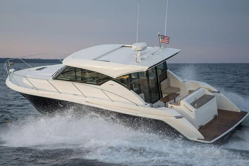 The Image of Manufacturer Provided Image: 2018 Tiara Yachts C39 Coupe cruising on the water at sunset. - 0