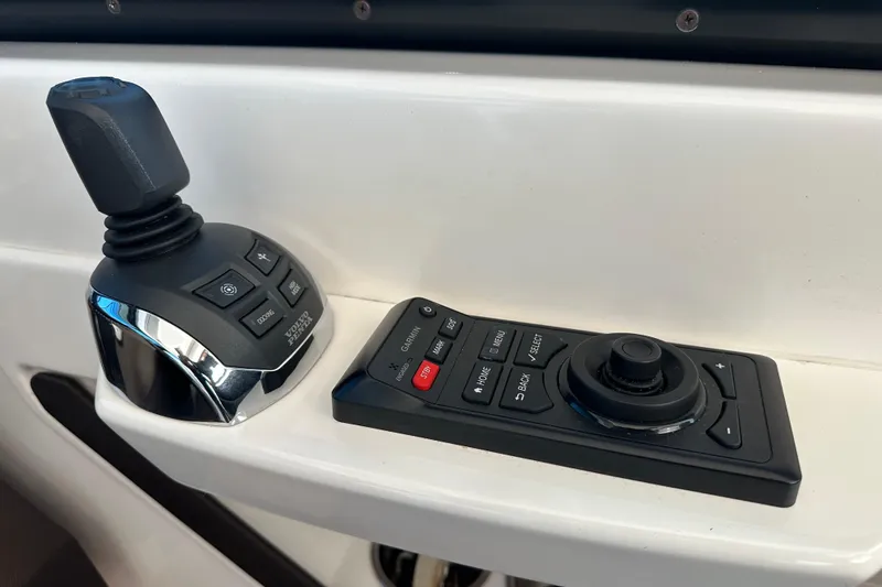 Slide: The Image of Control panel of 2018 Tiara Yachts C39 Coupe with joystick and navigation controls. - 13