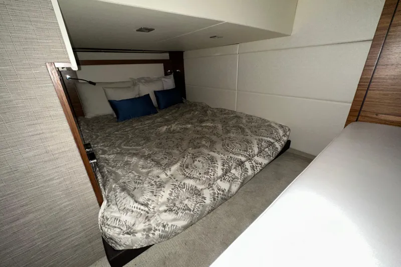 Slide: The Image of Luxurious bedroom interior of 2018 Tiara Yachts C39 Coupe with elegant bedding. - 26