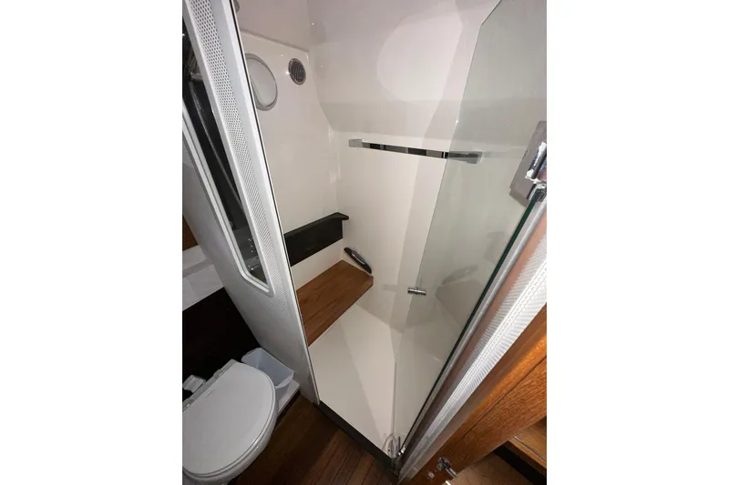 Slide: The Image of 2018 Tiara Yachts C39 Coupe bathroom with modern shower and toilet. - 32